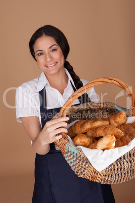 Lovely lady with fresh croissants