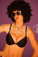 Sneering woman with black afro hairstyle