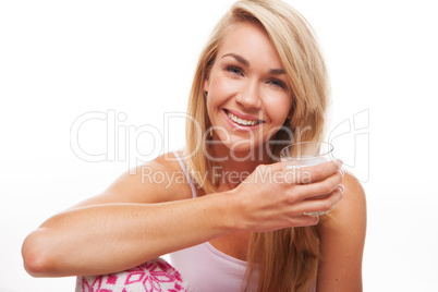 Happy woman drinking milk