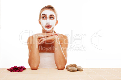 Woman sitting in a face mask