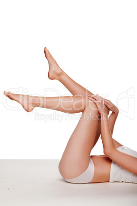 Woman kicking her legs in the air