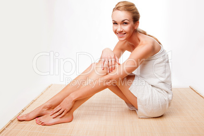 Beautiful woman relaxing in a towel