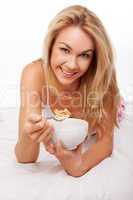 Beautiful woman enjoying a healthy breakfast