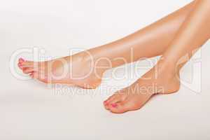 Female feet with varnished toenails