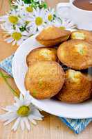 Biscuits with tea and camomiles
