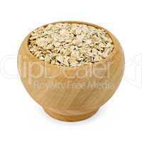 Oat flakes in a wooden bowl