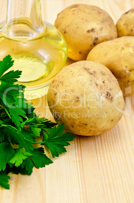 Potatoes yellow with parsley and oil