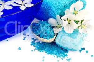 Salt and soap blue with towel and flowers of apple