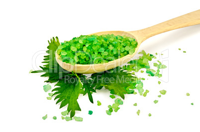 Salt of the green on the spoon with nettle