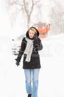 Woman calling for help broken car snow