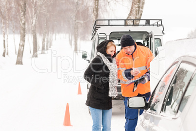 Woman fill document broken car snow mechanic