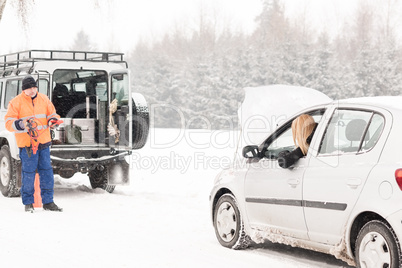 Winter car assistance man help woman breakdown