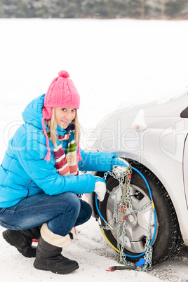 Snow tire chains winter car woman trouble
