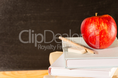 Traditional academic study school books and apple