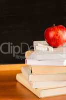 Traditional academic study school books and apple