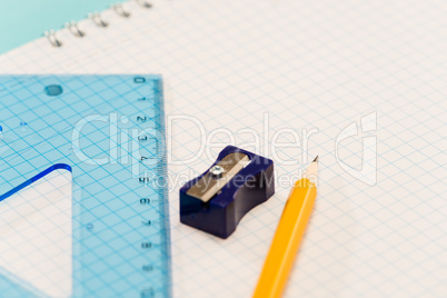 Sharpener with ruler pencil on notepad