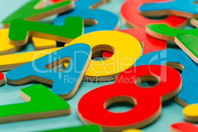 Colored wooden numbers and letters for children