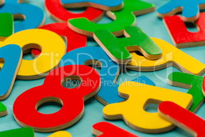 Colored wooden numbers and letters for children