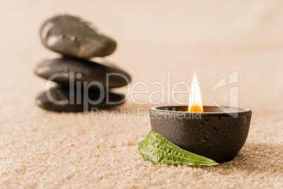 Spa still life candle with zen stones