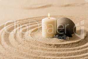 Spa atmosphere candle zen stones in sand