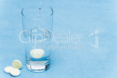 Soluble tablet throw in water glass