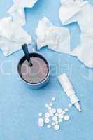 Cold illness medicaments, tea and tissues