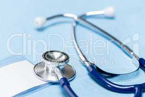 Blue stethoscope medical equipment close-up