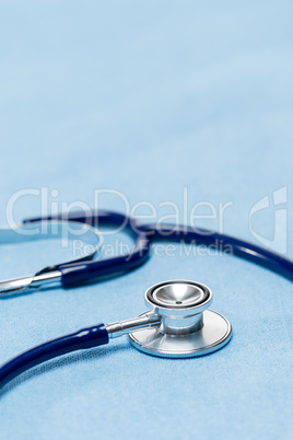 Blue stethoscope medical equipment close-up