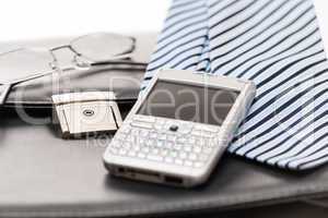 Business mens' accessories tie briefcase phone