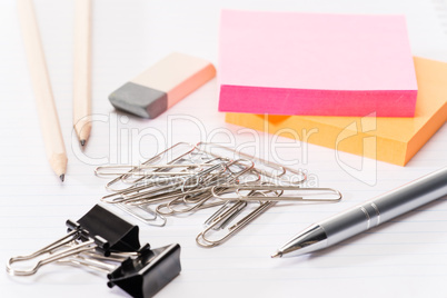 Paper pins with office supplies