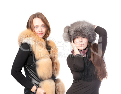 Two attractive women dressed for winter