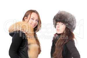 Two attractive women dressed for winter