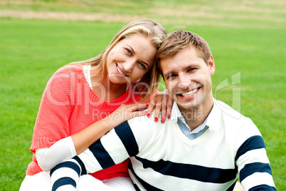 Adorable love couple, woman embracing her man