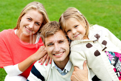 Joyous family of three. Loving and caring