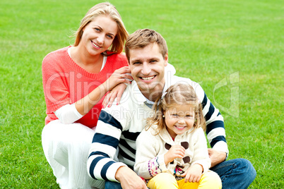 Outdoor happy caucasian family relaxing