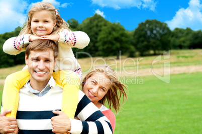 Family's day out in the park. Everyone enjoying