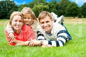 Joyous family in a park enjoying day out