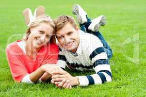 Attractive smiling young couple with strong bonding