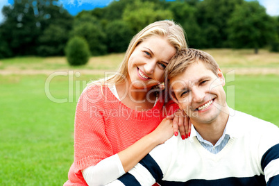 Lovely young couple striking a smiling pose