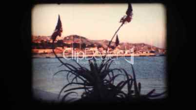 Vintage 8mm. View of port and sail boats