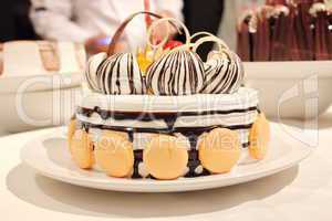 Beautiful  cakes with cream and macaron