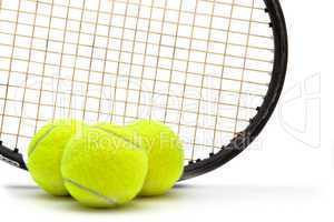 Tennis racket and ball isolated on white background