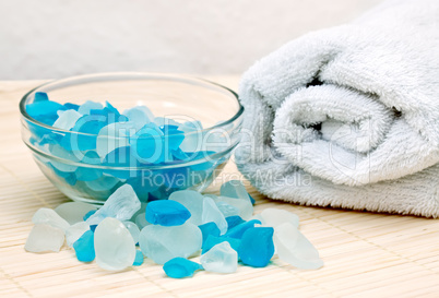 Towel and bath salts. Spa background