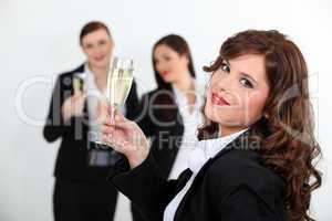 Women toasting with champagne