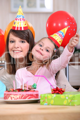 Little girl at birthday party