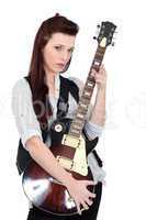 Brunette posing with electric guitar