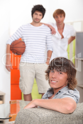 Guys waiting to play basketball
