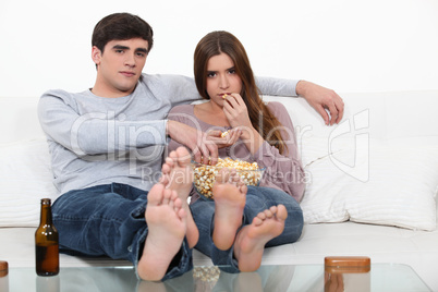 Couple eating popcorn