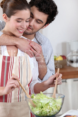 Couple preparing a nice salad