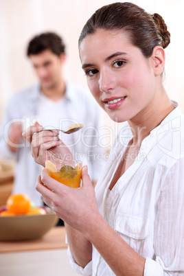 Couple having breakfast together at home